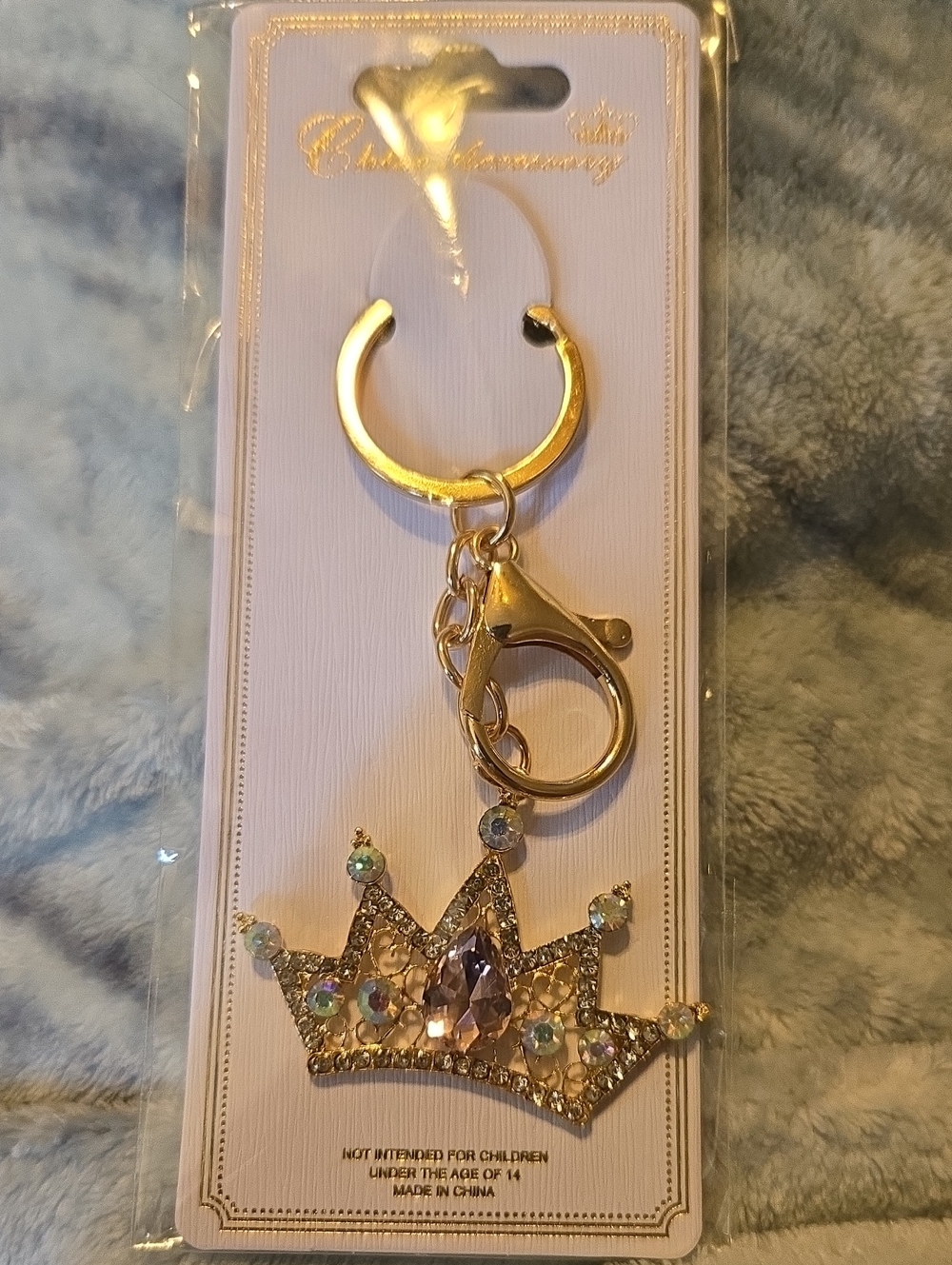 3/$10 Bundle Deals Crown Crystal Keychain - Gold With A Light Pink Gem
